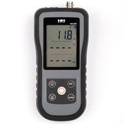 HM Digital HM-200 portable pH/EC/TDS/temp monitor with display and included batteries on a white background.