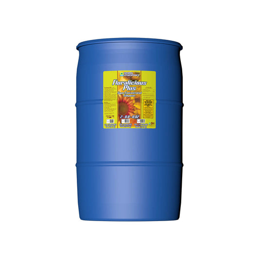 Large 55-gallon drum of General Hydroponics Floralicious Plus plant enhancer, a hydroponic nutrient for healthy plant growth.